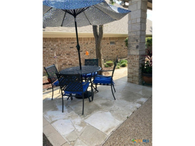 Wonderful country club location, custom built courtyard home on on Wildflower Country Club in Texas - for sale on GolfHomes.com, golf home, golf lot