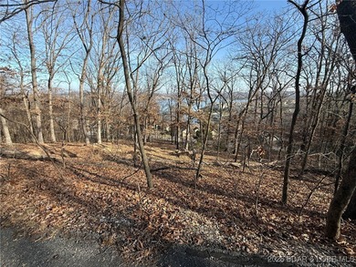 Discover the perfect setting for your dream home on this on The Club At Porto Cima in Missouri - for sale on GolfHomes.com, golf home, golf lot