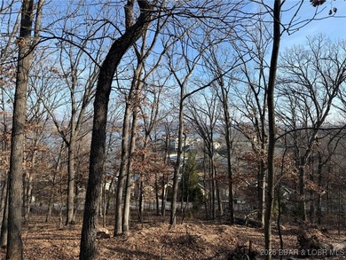 Discover the perfect setting for your dream home on this on The Club At Porto Cima in Missouri - for sale on GolfHomes.com, golf home, golf lot