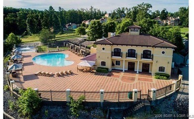 Discover the perfect setting for your dream home on this on The Club At Porto Cima in Missouri - for sale on GolfHomes.com, golf home, golf lot