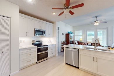 Fabulously updated END UNIT golf view home w/loads of light on Oak Harbor Country Club in Florida - for sale on GolfHomes.com, golf home, golf lot