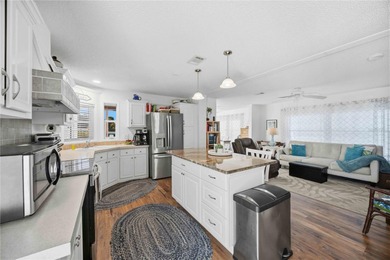 COZY AND UPDATED 2/2 home located in the desirable 55+ community on Twin Isles Country Club in Florida - for sale on GolfHomes.com, golf home, golf lot