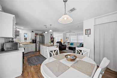 COZY AND UPDATED 2/2 home located in the desirable 55+ community on Twin Isles Country Club in Florida - for sale on GolfHomes.com, golf home, golf lot