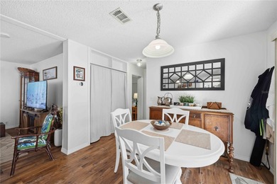 COZY AND UPDATED 2/2 home located in the desirable 55+ community on Twin Isles Country Club in Florida - for sale on GolfHomes.com, golf home, golf lot