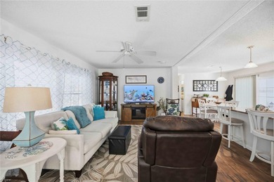 COZY AND UPDATED 2/2 home located in the desirable 55+ community on Twin Isles Country Club in Florida - for sale on GolfHomes.com, golf home, golf lot