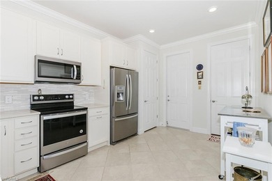 This beautiful Seagrove floor plan has views of POND & GOLF on Panther Run Golf Club in Florida - for sale on GolfHomes.com, golf home, golf lot