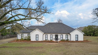 Exceptional curb appeal welcomes you to this beautiful 2,616 sq on Cottonwood Golf Club in Alabama - for sale on GolfHomes.com, golf home, golf lot