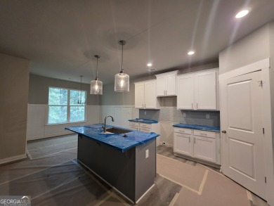 ONLY A FEW HOMES REMAIN IN THE LINKS SECTION OF TRADITOINS OF on Traditions of Braselton Golf Club in Georgia - for sale on GolfHomes.com, golf home, golf lot