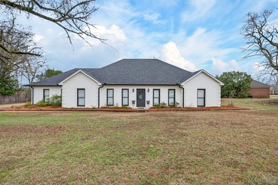 Exceptional curb appeal welcomes you to this beautiful 2,616 sq on Cottonwood Golf Club in Alabama - for sale on GolfHomes.com, golf home, golf lot