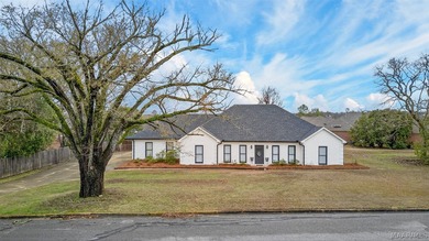 Exceptional curb appeal welcomes you to this beautiful 2,616 sq on Cottonwood Golf Club in Alabama - for sale on GolfHomes.com, golf home, golf lot