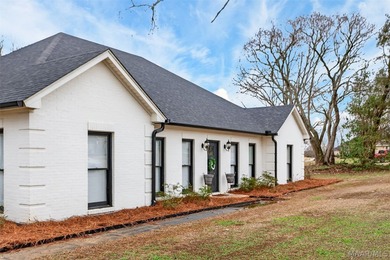 Exceptional curb appeal welcomes you to this beautiful 2,616 sq on Cottonwood Golf Club in Alabama - for sale on GolfHomes.com, golf home, golf lot