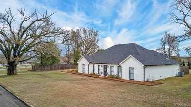 Exceptional curb appeal welcomes you to this beautiful 2,616 sq on Cottonwood Golf Club in Alabama - for sale on GolfHomes.com, golf home, golf lot