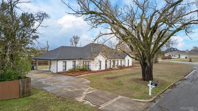 Exceptional curb appeal welcomes you to this beautiful 2,616 sq on Cottonwood Golf Club in Alabama - for sale on GolfHomes.com, golf home, golf lot