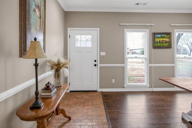 Exceptional curb appeal welcomes you to this beautiful 2,616 sq on Cottonwood Golf Club in Alabama - for sale on GolfHomes.com, golf home, golf lot