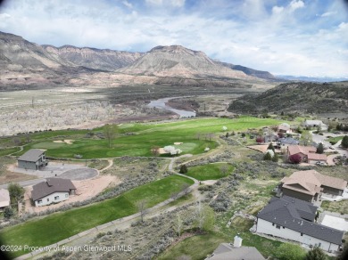 This exceptional .52-acre lot, borders the 17th fairway of on Battlement Mesa Golf Course in Colorado - for sale on GolfHomes.com, golf home, golf lot