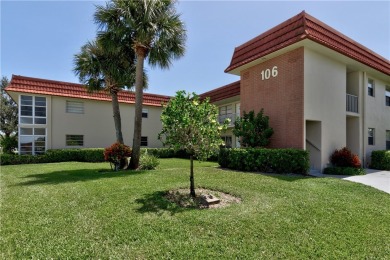 Fully Furnished, turnkey, end unit overlooking the 4th tee and on The American Golf Club in Florida - for sale on GolfHomes.com, golf home, golf lot
