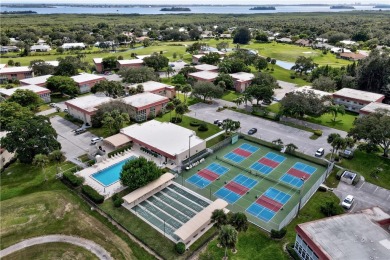 Fully Furnished, turnkey, end unit overlooking the 4th tee and on The American Golf Club in Florida - for sale on GolfHomes.com, golf home, golf lot
