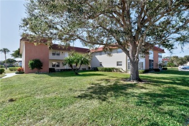 Fully Furnished, turnkey, end unit overlooking the 4th tee and on The American Golf Club in Florida - for sale on GolfHomes.com, golf home, golf lot
