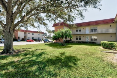 Fully Furnished, turnkey, end unit overlooking the 4th tee and on The American Golf Club in Florida - for sale on GolfHomes.com, golf home, golf lot