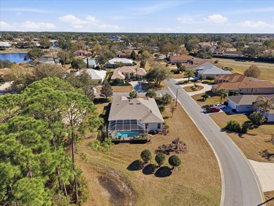 2003 Addison Osprey pool home on .32 acre backing to on Glen Lakes Country Club in Florida - for sale on GolfHomes.com, golf home, golf lot