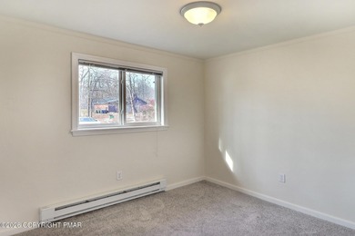 Resort-Style Living at an Affordable Price! Welcome home to this on Pocono Farms Country Club in Pennsylvania - for sale on GolfHomes.com, golf home, golf lot