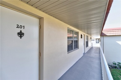 Fully Furnished, turnkey, end unit overlooking the 4th tee and on The American Golf Club in Florida - for sale on GolfHomes.com, golf home, golf lot