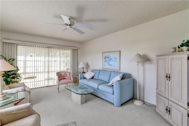 Fully Furnished, turnkey, end unit overlooking the 4th tee and on The American Golf Club in Florida - for sale on GolfHomes.com, golf home, golf lot