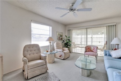Fully Furnished, turnkey, end unit overlooking the 4th tee and on The American Golf Club in Florida - for sale on GolfHomes.com, golf home, golf lot