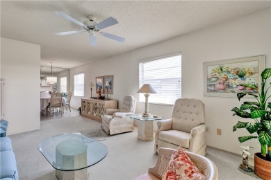 Fully Furnished, turnkey, end unit overlooking the 4th tee and on The American Golf Club in Florida - for sale on GolfHomes.com, golf home, golf lot