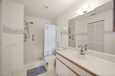 Turnkey 2-bedroom plus den, 2-bath second-floor, end unit condo on The Old Collier Golf Club in Florida - for sale on GolfHomes.com, golf home, golf lot