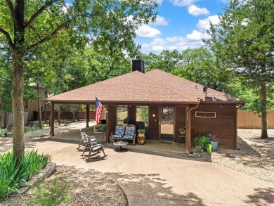 Here, nestled in a wooded wonderland, lies your next home away on Tanglewood Resort in Texas - for sale on GolfHomes.com, golf home, golf lot