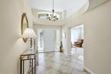 Nestled on a private homesite at the end of a quiet cul-de-sac on University Park Country Club in Florida - for sale on GolfHomes.com, golf home, golf lot