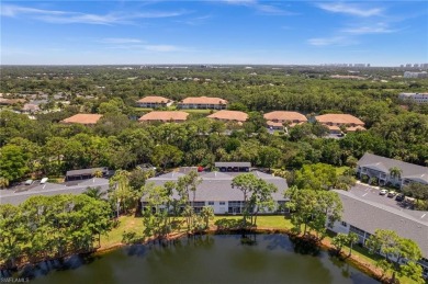 Turnkey 2-bedroom plus den, 2-bath second-floor, end unit condo on The Old Collier Golf Club in Florida - for sale on GolfHomes.com, golf home, golf lot
