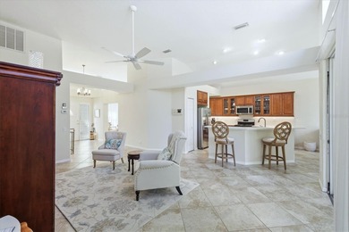 Nestled on a private homesite at the end of a quiet cul-de-sac on University Park Country Club in Florida - for sale on GolfHomes.com, golf home, golf lot