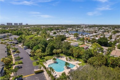 Turnkey 2-bedroom plus den, 2-bath second-floor, end unit condo on The Old Collier Golf Club in Florida - for sale on GolfHomes.com, golf home, golf lot