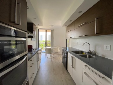 Live in the Heart of Aventura! Step into comfort and style with on Turnberry Isle Resort and Club in Florida - for sale on GolfHomes.com, golf home, golf lot