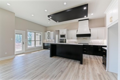 Welcome to this exquisite new construction home in Greystone on Greystone Country Club in Arkansas - for sale on GolfHomes.com, golf home, golf lot