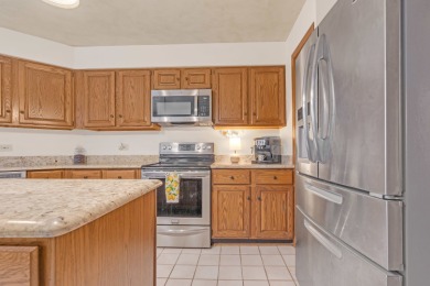 Discover the perfect blend of comfort and elegance in this on Oak Hills Country Club in Illinois - for sale on GolfHomes.com, golf home, golf lot