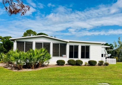 Welcome to this charming two-bedroom, two-bath home located in on Pine Lakes Country Club in Florida - for sale on GolfHomes.com, golf home, golf lot