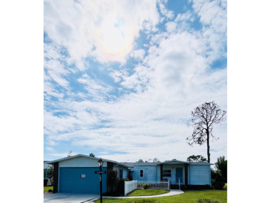 Welcome to this charming two-bedroom, two-bath home located in on Pine Lakes Country Club in Florida - for sale on GolfHomes.com, golf home, golf lot