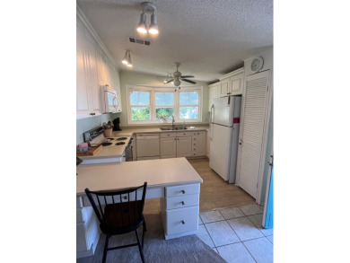 Welcome to this charming two-bedroom, two-bath home located in on Pine Lakes Country Club in Florida - for sale on GolfHomes.com, golf home, golf lot
