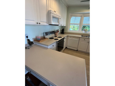 Welcome to this charming two-bedroom, two-bath home located in on Pine Lakes Country Club in Florida - for sale on GolfHomes.com, golf home, golf lot