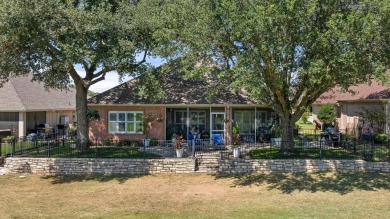 Gorgeous - fantastic drive up appeal and outstanding golf lot on Pecan Plantation Country Club in Texas - for sale on GolfHomes.com, golf home, golf lot
