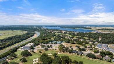 Gorgeous - fantastic drive up appeal and outstanding golf lot on Pecan Plantation Country Club in Texas - for sale on GolfHomes.com, golf home, golf lot