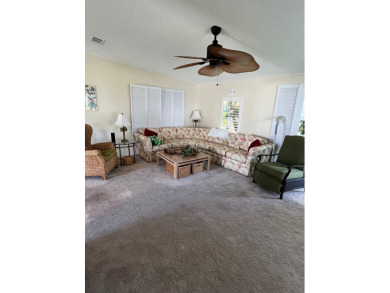 Welcome to this charming two-bedroom, two-bath home located in on Pine Lakes Country Club in Florida - for sale on GolfHomes.com, golf home, golf lot