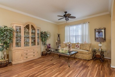 Exceptional and stunning executive pool home situated on a pond on Heritage Harbor Golf and Country Club in Florida - for sale on GolfHomes.com, golf home, golf lot