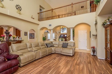 Exceptional and stunning executive pool home situated on a pond on Heritage Harbor Golf and Country Club in Florida - for sale on GolfHomes.com, golf home, golf lot