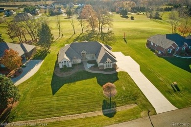 This Gorgeous Brick Ranch w/ oversized 3 car attached garage on Metamora Country Club in Michigan - for sale on GolfHomes.com, golf home, golf lot