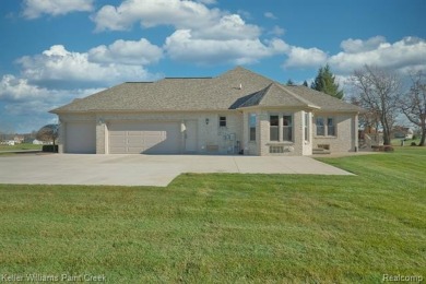 This Gorgeous Brick Ranch w/ oversized 3 car attached garage on Metamora Country Club in Michigan - for sale on GolfHomes.com, golf home, golf lot