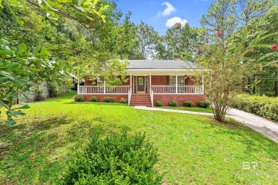CHARMING three-bedroom, two-bath brick home situated in a quiet on Lake Forest Yacht and Country Club in Alabama - for sale on GolfHomes.com, golf home, golf lot